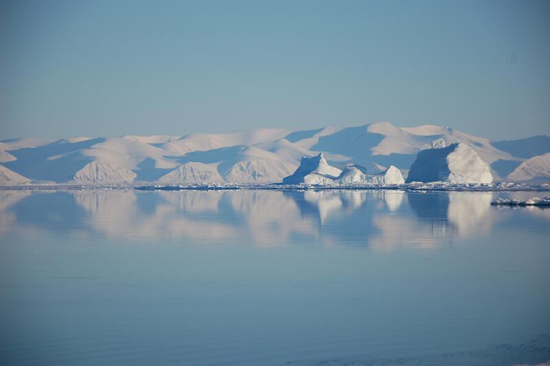 Arctic Kingdom THOMAS LENNARTZ Iceberg reflecting in ocean Pond Inlet June DSC 6059 copy